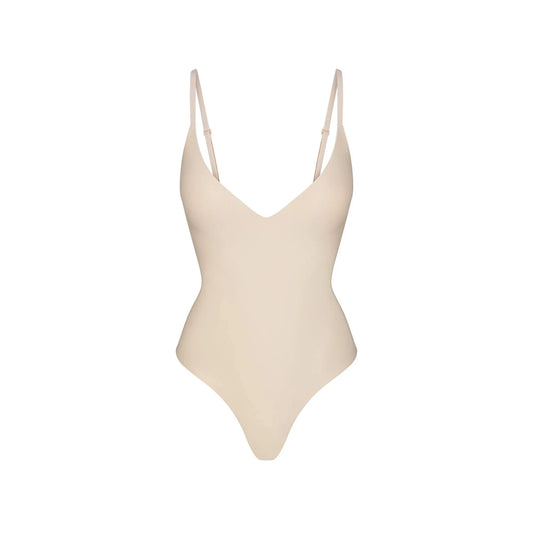 SKIMS-BODYSUIT-BD-THG-5618W-SND.webp